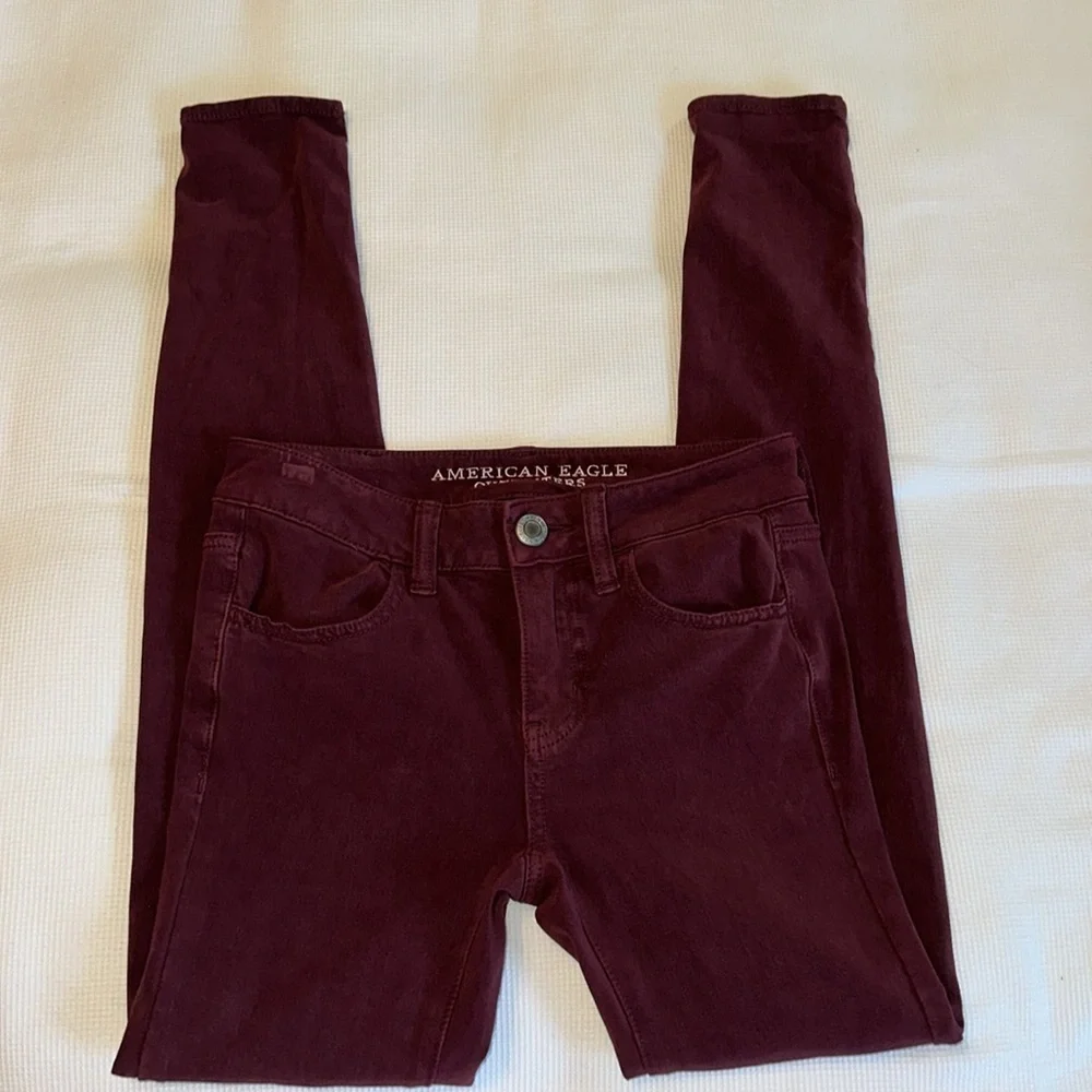 American Eagles 360 Super Stretch Jegging Size 0 Regular Burgundy Color